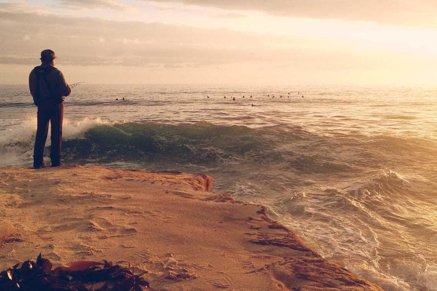 New York rooftops seen from above, water towers and shadows forming a geometric pattern